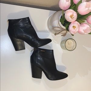 Calvin Klein black booties